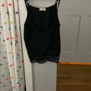 Black crop tank, with detailing at the bottom